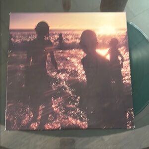 Vinyl Record with Sunset Silhouette Cover
